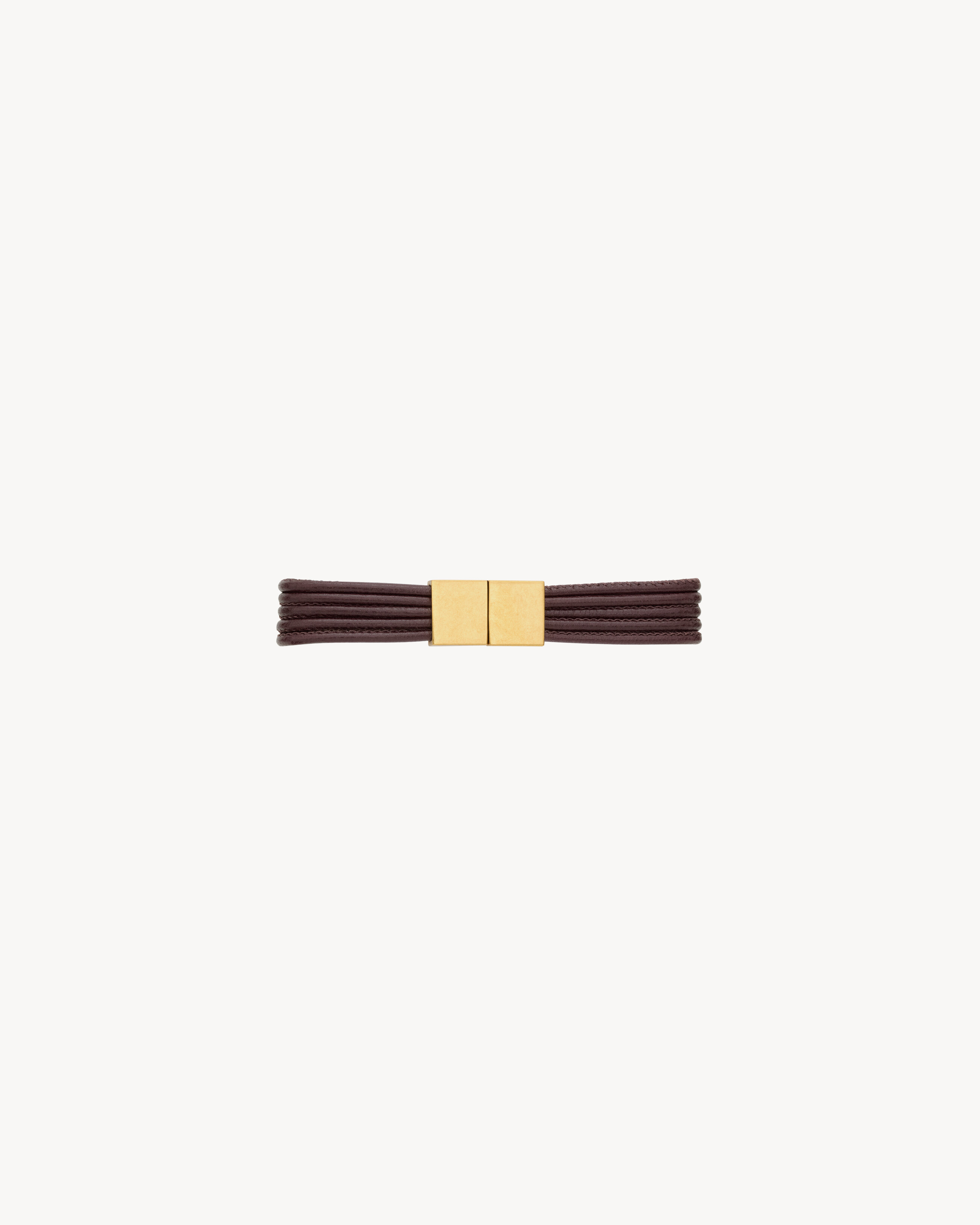 CASSANDRE cord bracelet in leather and metal