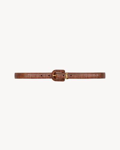 CASSANDRE covered U buckle thin belt in crocodile-embossed leather