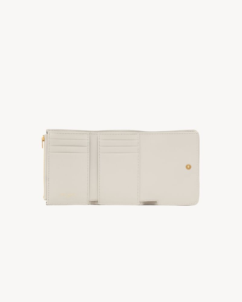 NIKI slim tri-fold wallet in vintage leather