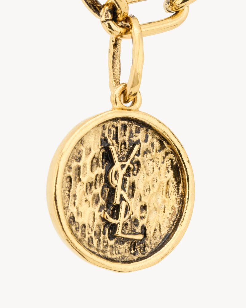 CASSANDRE medallion bracelet in metal