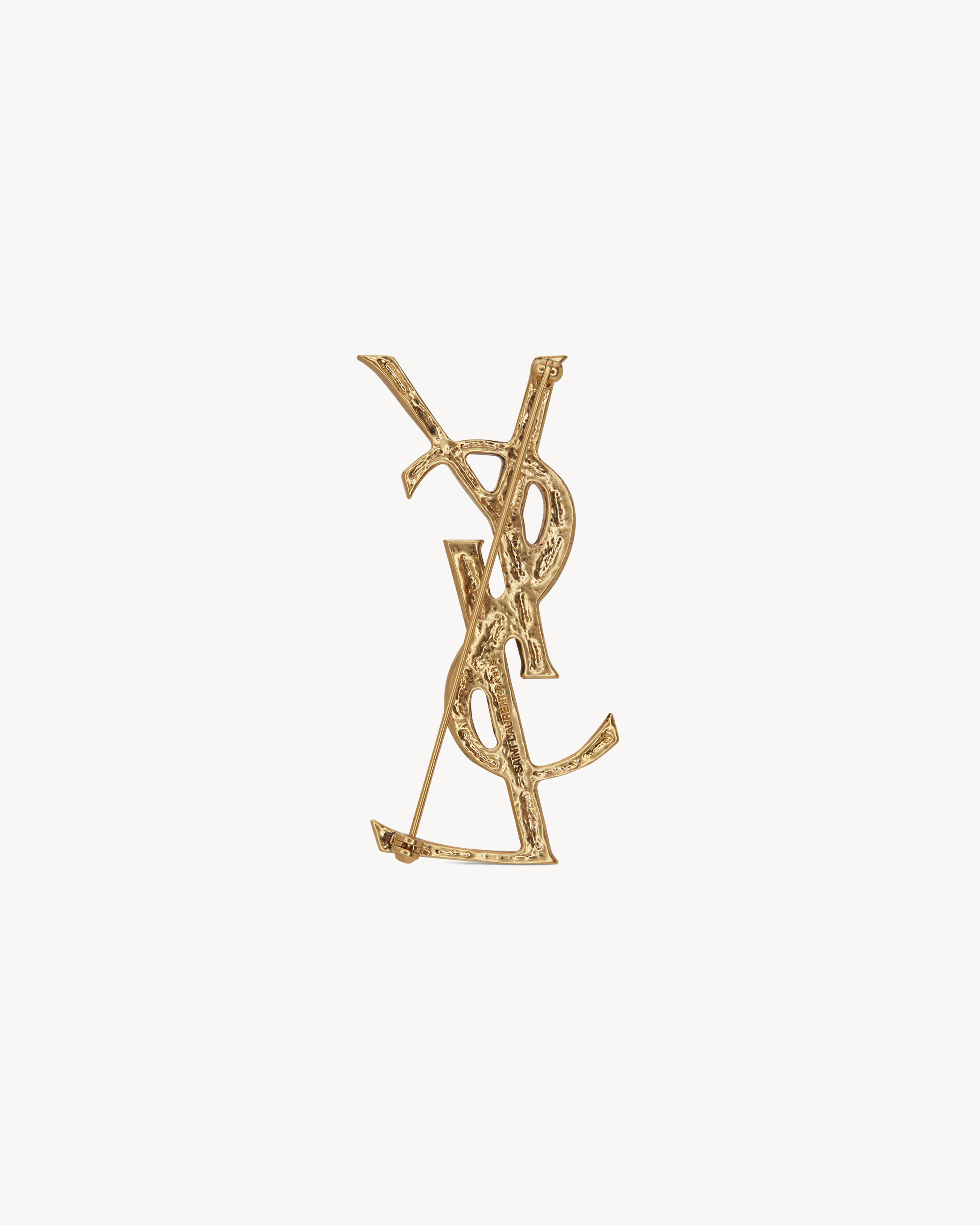 CASSANDRE crocodile brooch in metal