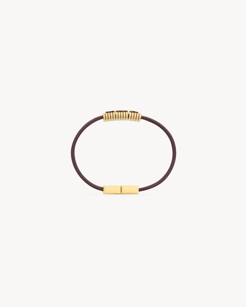 CASSANDRE cord bracelet in leather and metal
