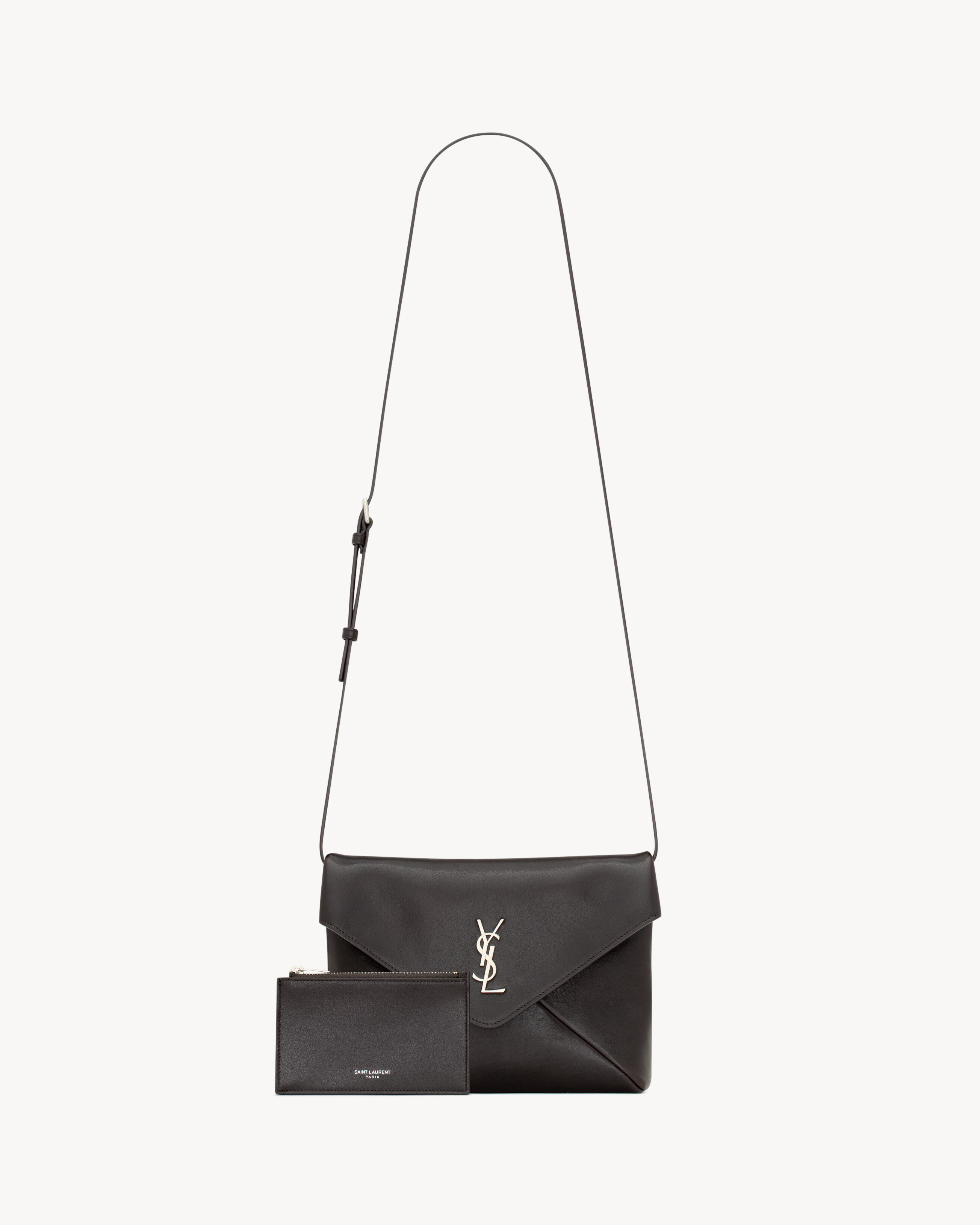 CASSANDRE envelope messenger in leather