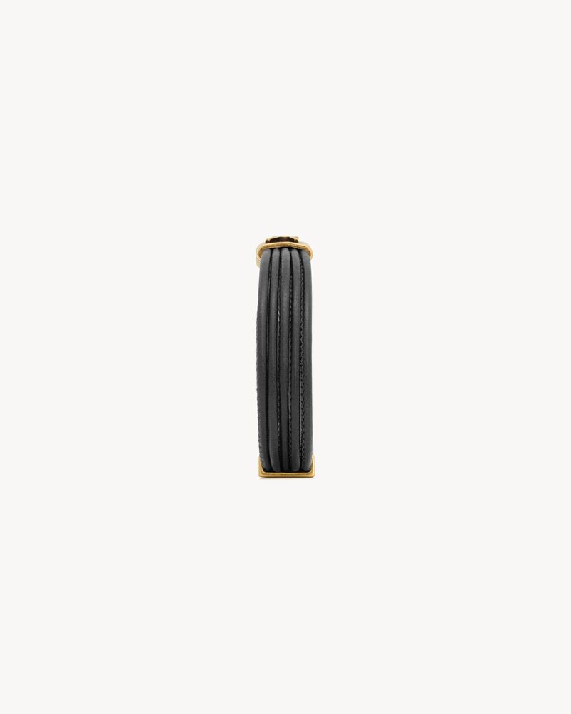 CASSANDRE cord bracelet in leather and metal