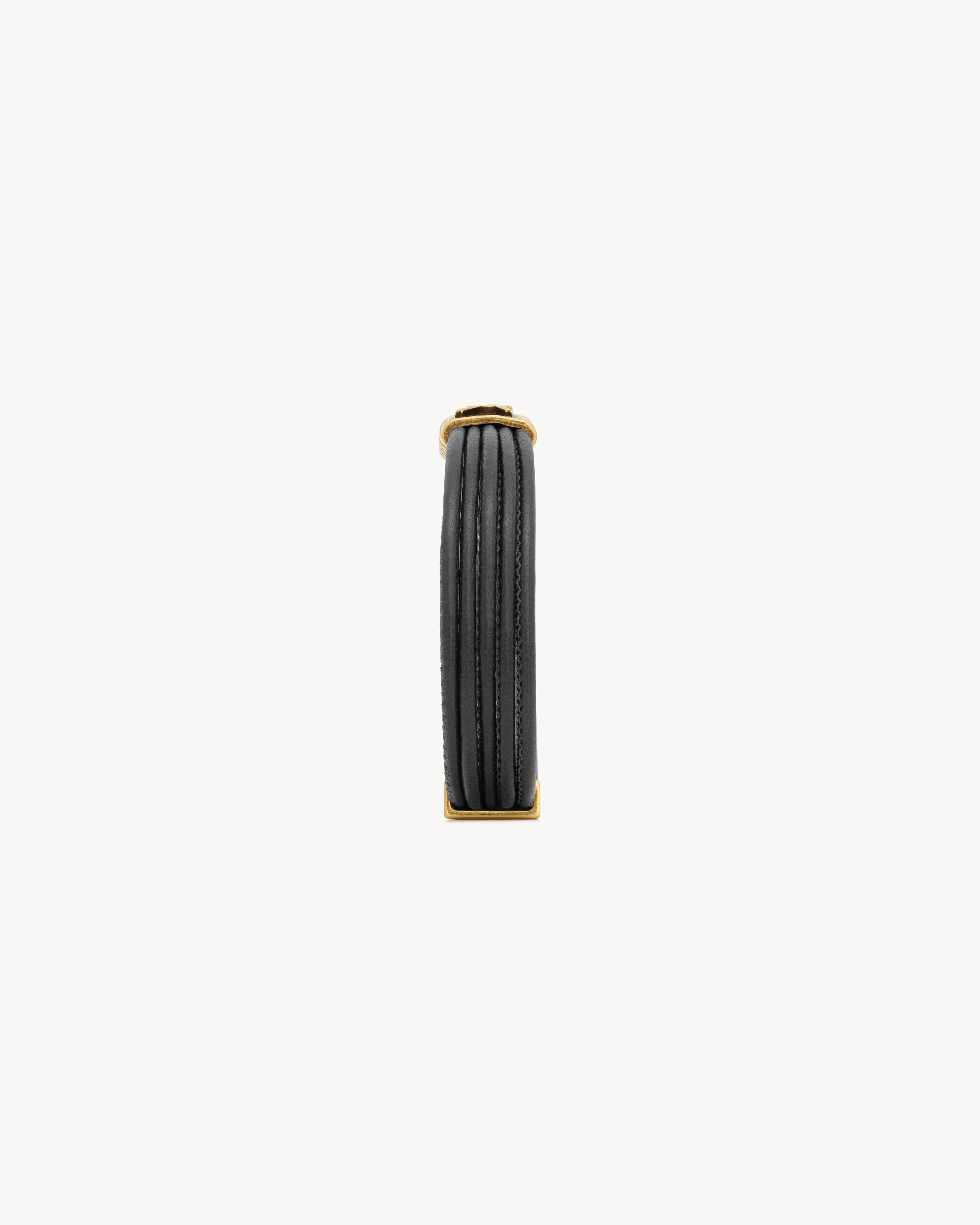 CASSANDRE cord bracelet in leather and metal