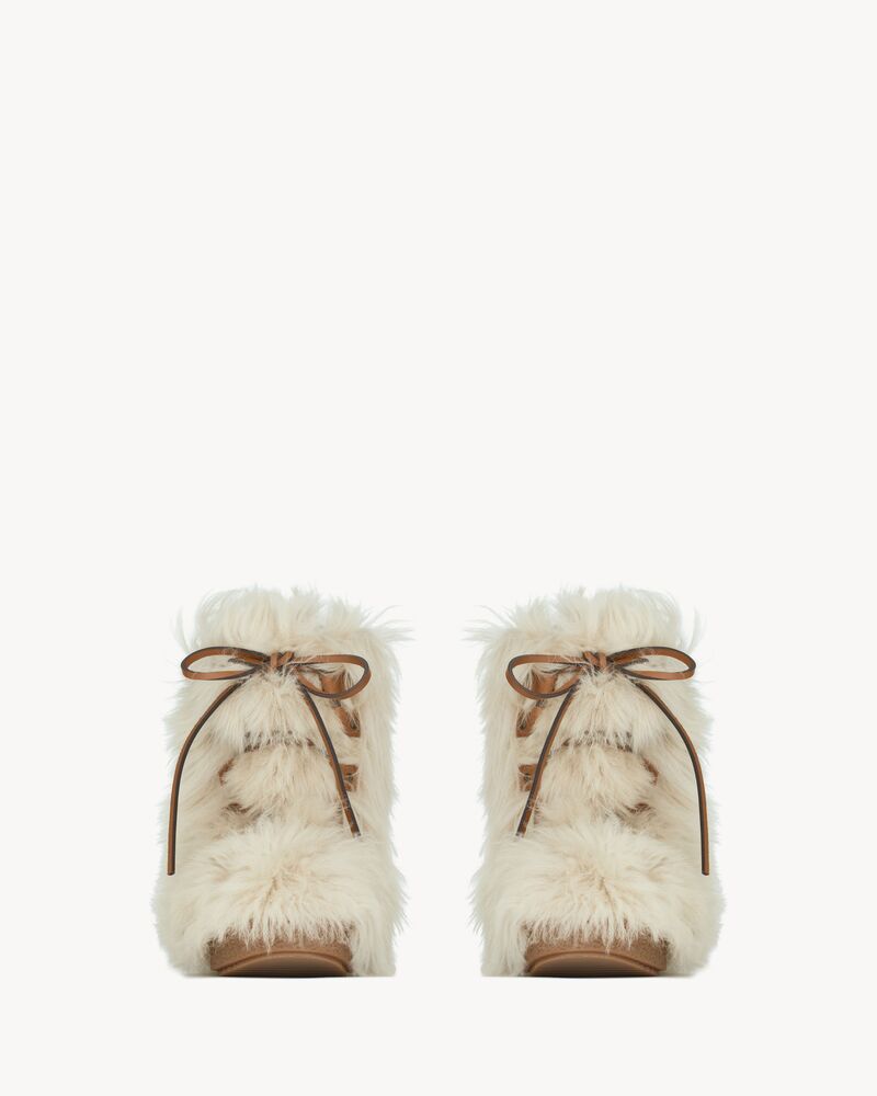 SNOW BOOTS IN SHEARLING