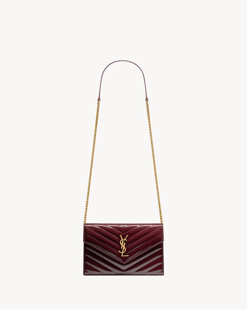 CASSANDRE envelope chain wallet in patent leather