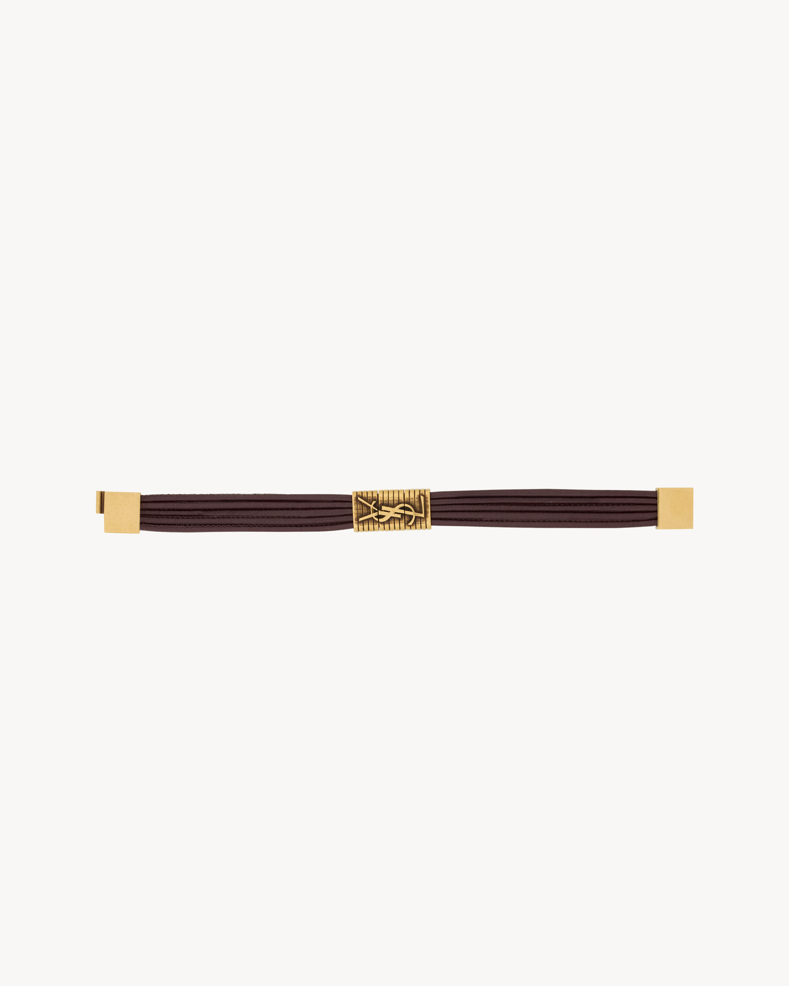 CASSANDRE cord bracelet in leather and metal