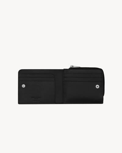 East/West zip-around wallet in grain de poudre embossed leather, Saint  Laurent