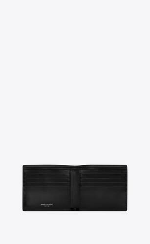 tiny cassandre east/west wallet in shiny leather