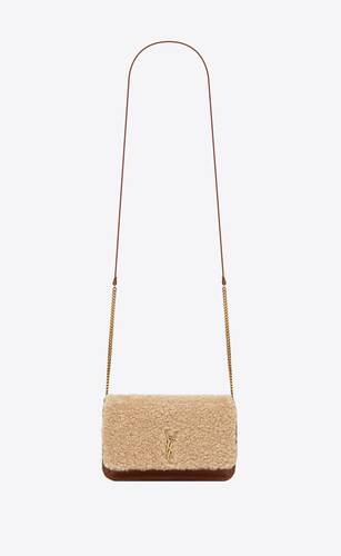 cassandre phone holder with strap in shearling and smooth leather