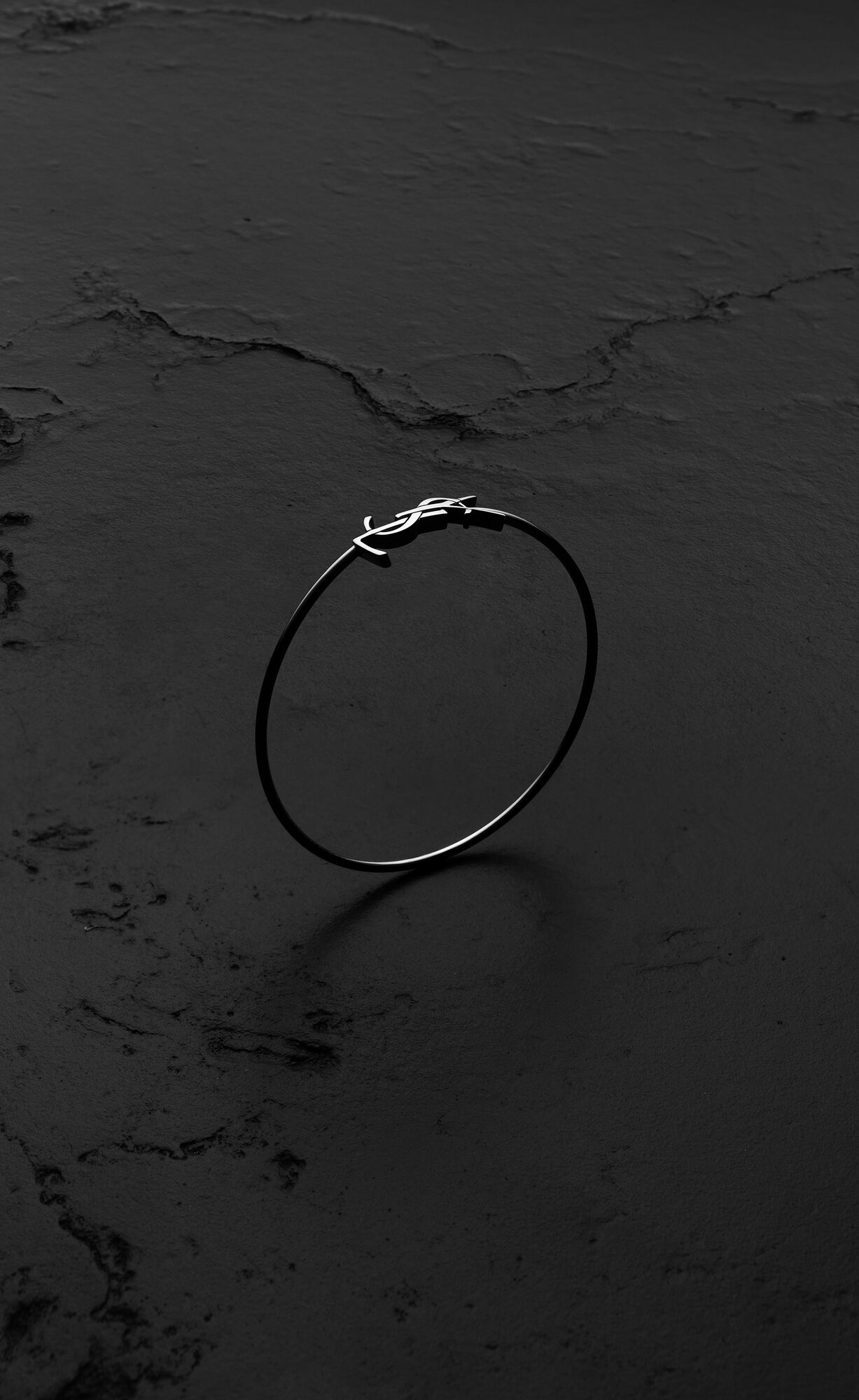 CASSANDRE hinged bangle in 18K grey gold in Silver | Saint Laurent | YSL US