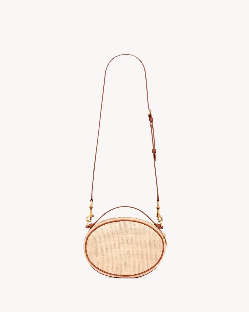 Camera bag in raffia and vegetable-tanned leather