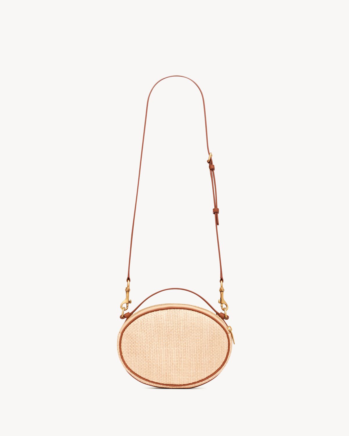 camera bag in raffia and vegetable-tanned leather