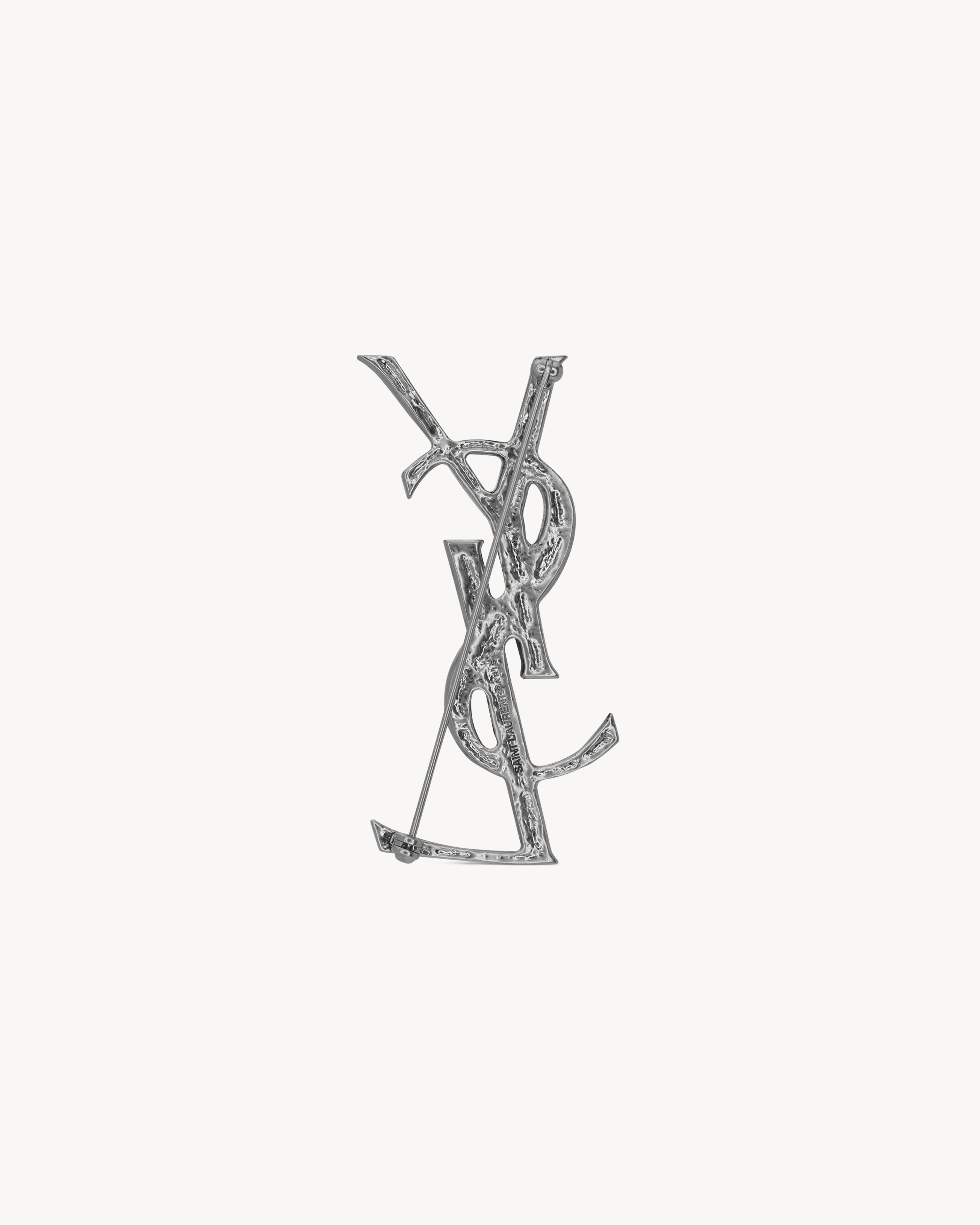 CASSANDRE crocodile brooch in metal