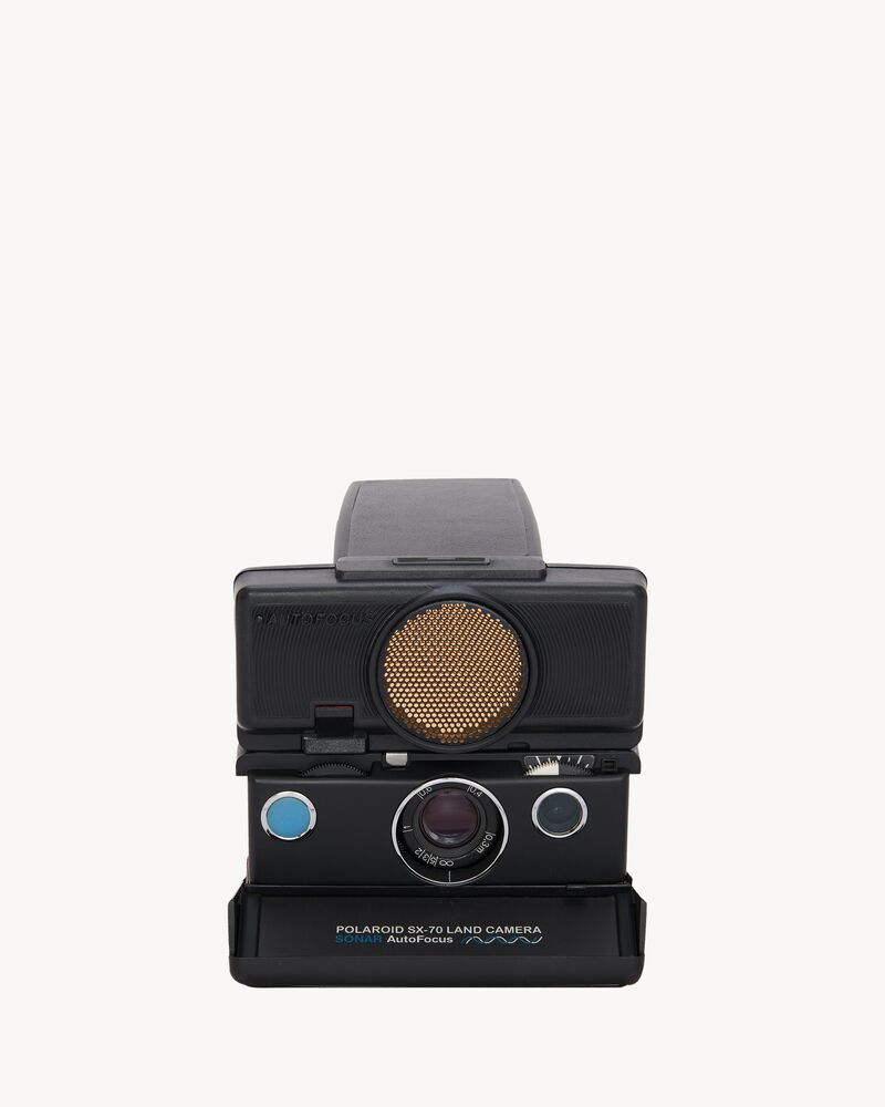 polaroid sx70 instant camera en cuir