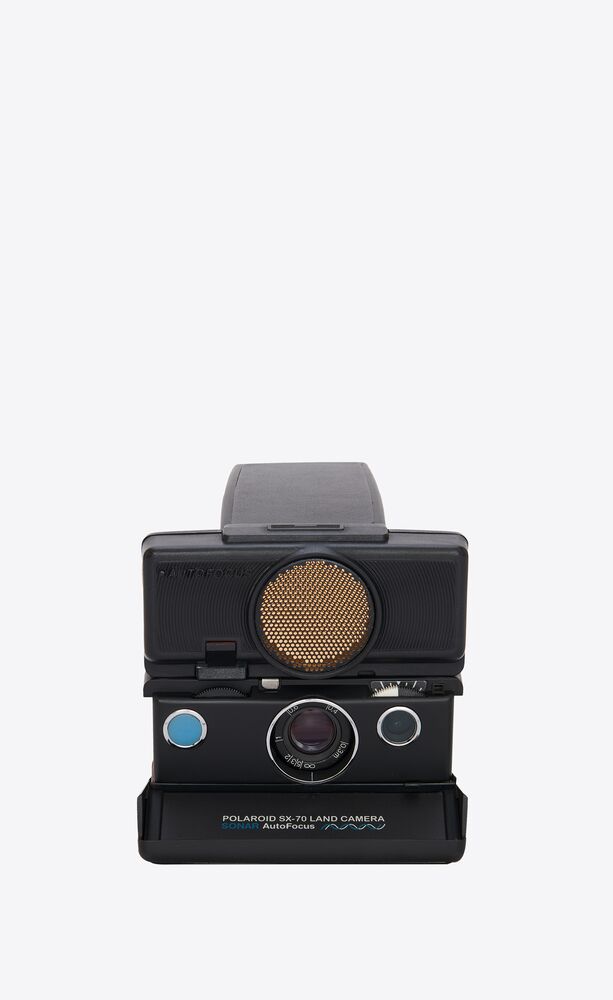 polaroid sx70 instant camera in leather