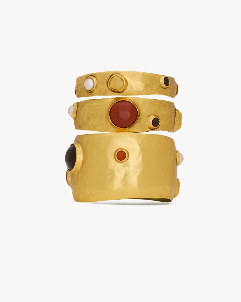 CASSANDRE cabochon bangles in enamel, resin, glass, and metal