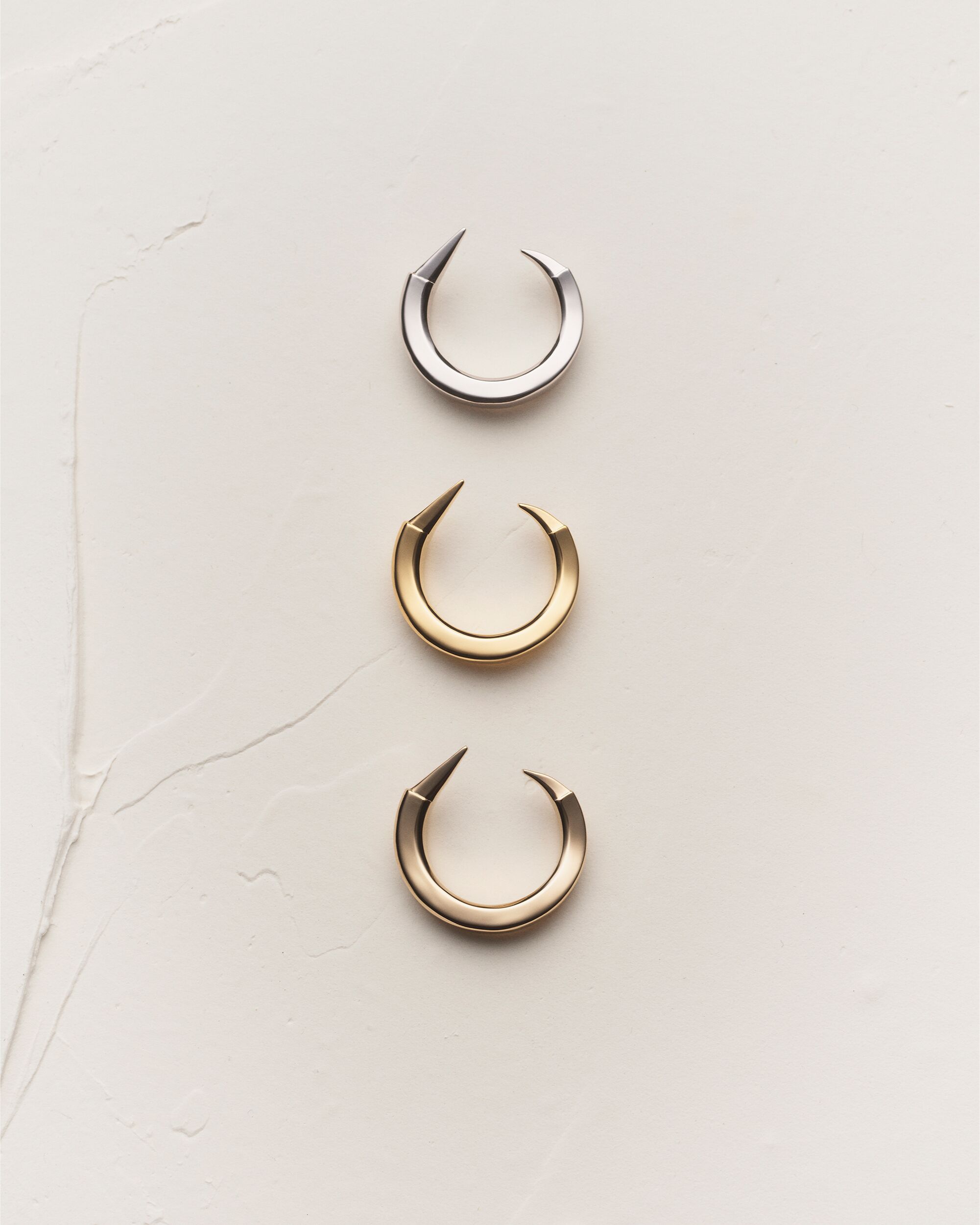 Spiky rings in 18K grey gold, yellow, gold and pale gold