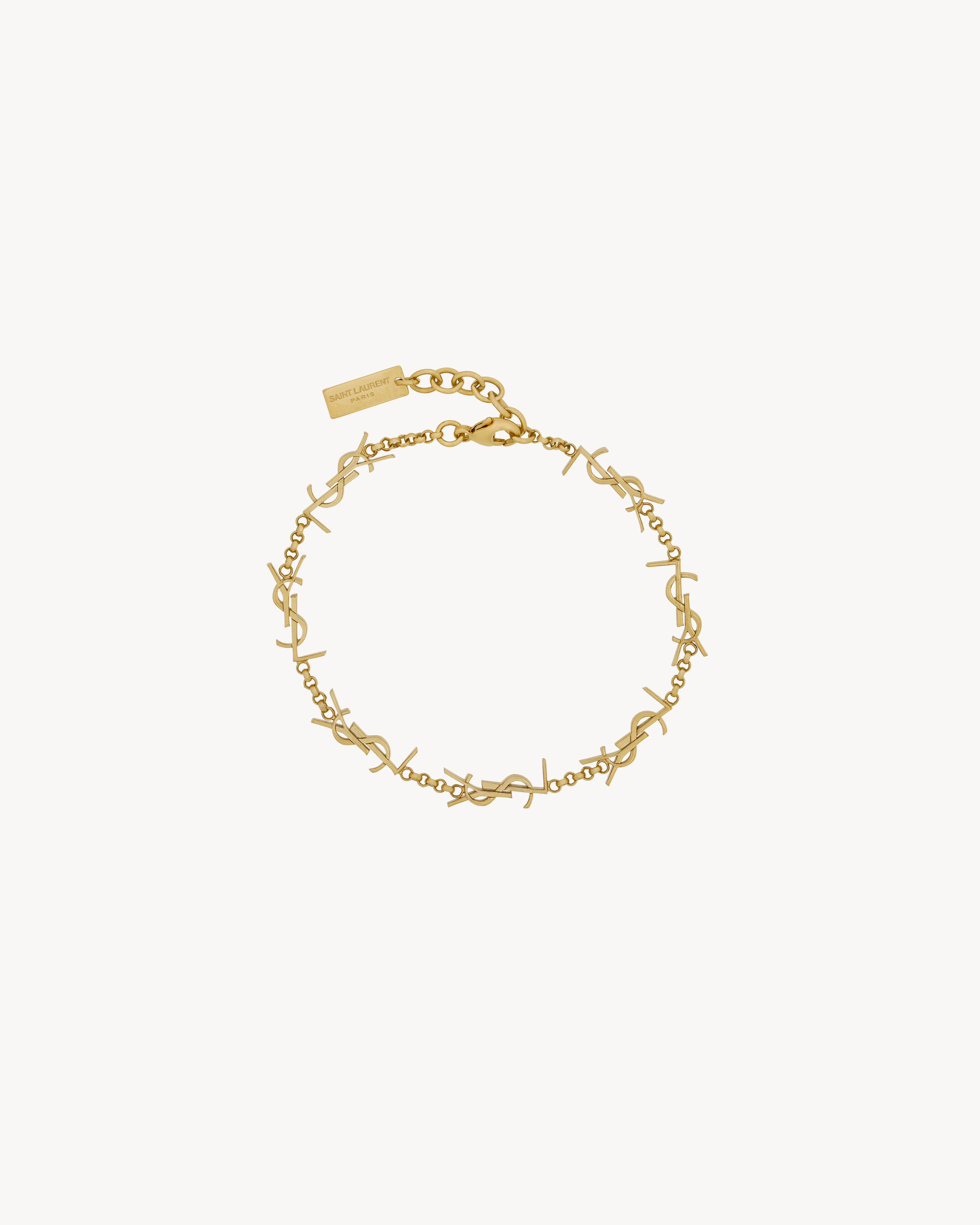 Pulseira com múltiplos adereços CASSANDRE em metal