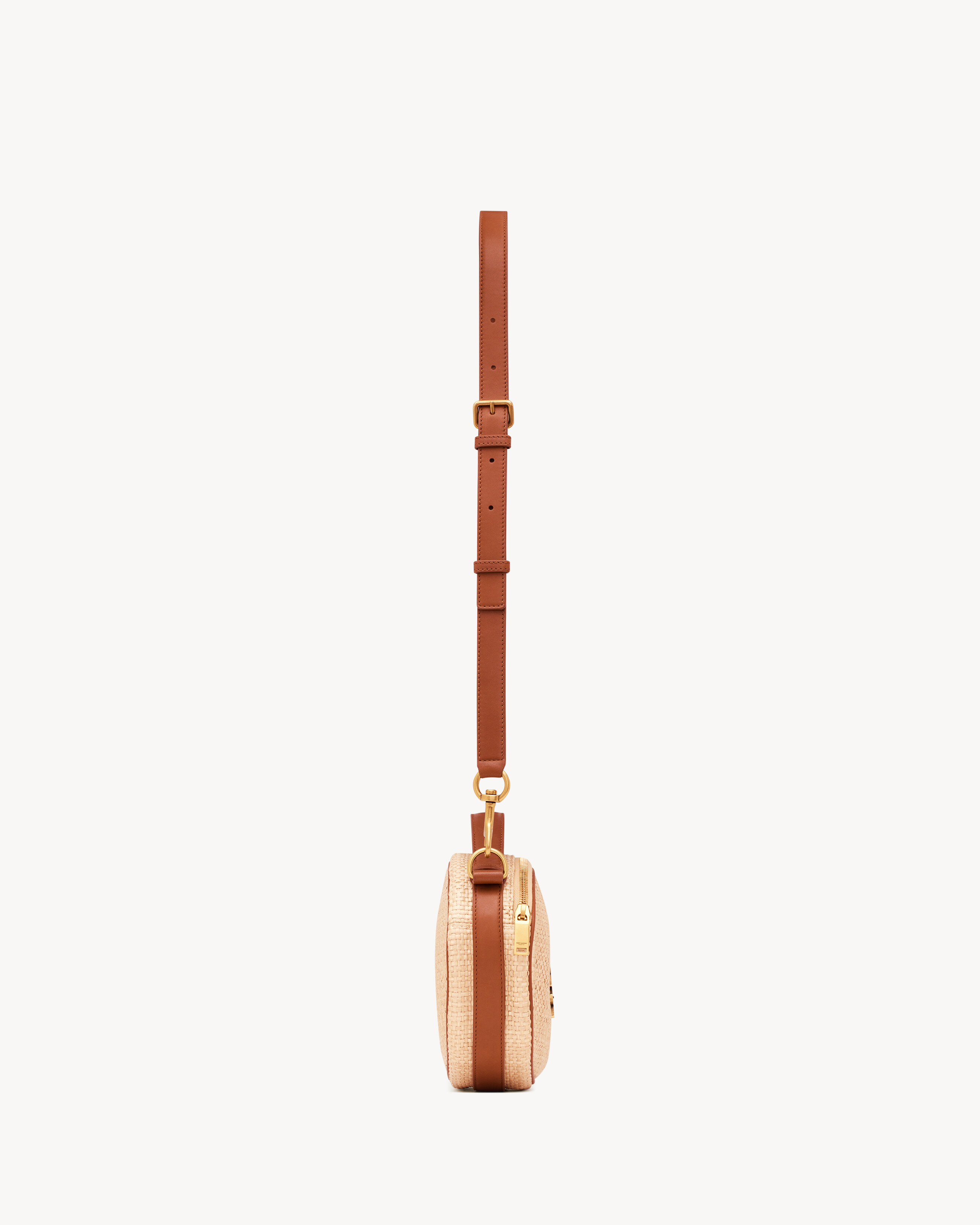 Camera bag in raffia and vegetable-tanned leather