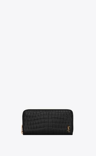 tiny cassandre zip-around wallet in crocodile-embossed matte leather