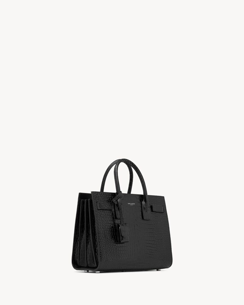 sac de jour aus schwarzem leder in krokodilprägung - baby