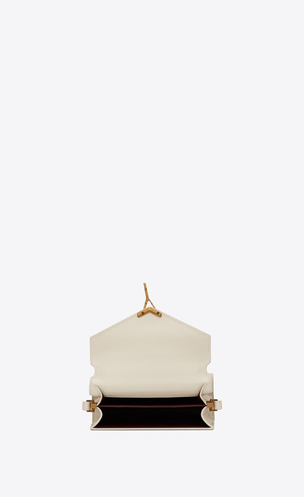 CASSANDRA Mini top handle bag in grain de poudre embossed leather | Saint Laurent | YSL.com