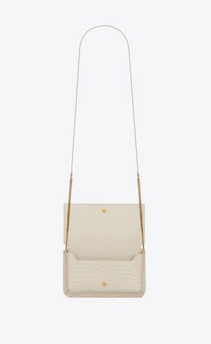 CASSANDRE phone holder with strap in SHINY crocodile-embossed leather ...