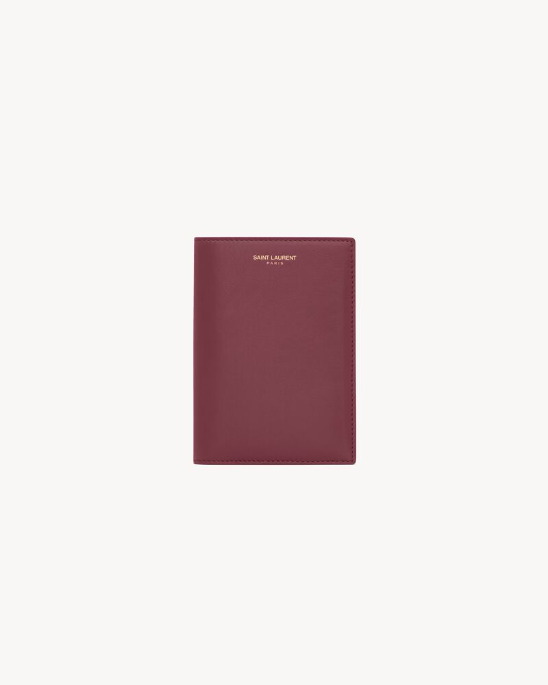 SAINT LAURENT PARIS PASSPORT CASE IN shiny leather