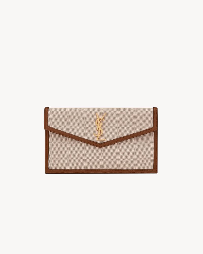 Pochette Uptown de lona y piel lisa