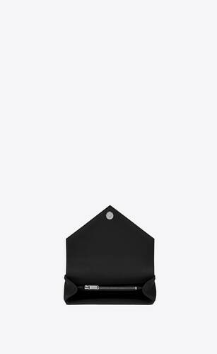 mittlere satcheltasche aus schwarzem matelassé-ledermischgewebe mit struktur