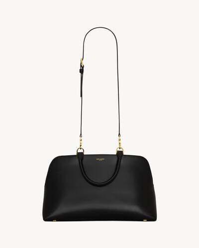 Yves Saint Laurent - Black Leather Shoulder Bag w/ Antler Handle – Current  Boutique