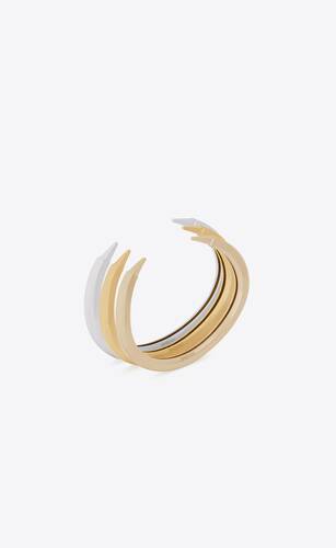 claw bracelets in 18k grey, yellow, and pale gold