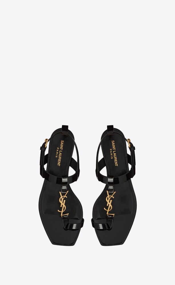 cassandra flat sandals in patent leather with gold-tone monogram