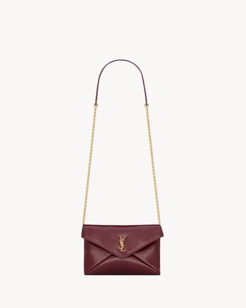 CASSANDRE chain pouch in shiny leather