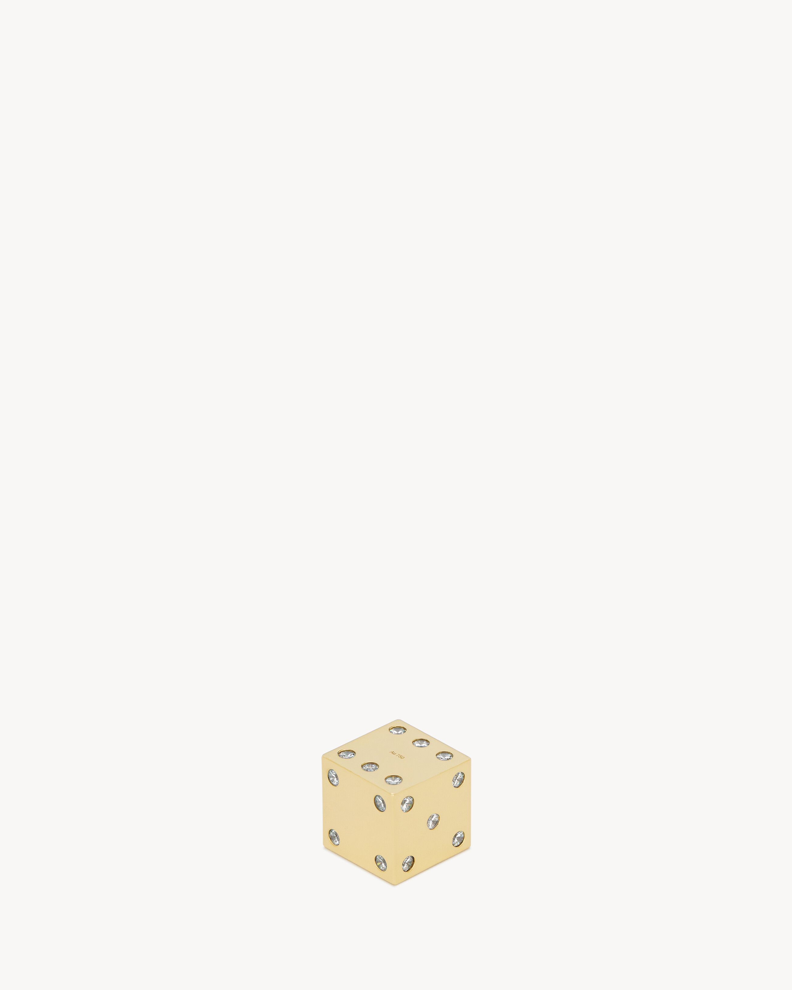 Diamond-embellished dice in 18K yellow gold