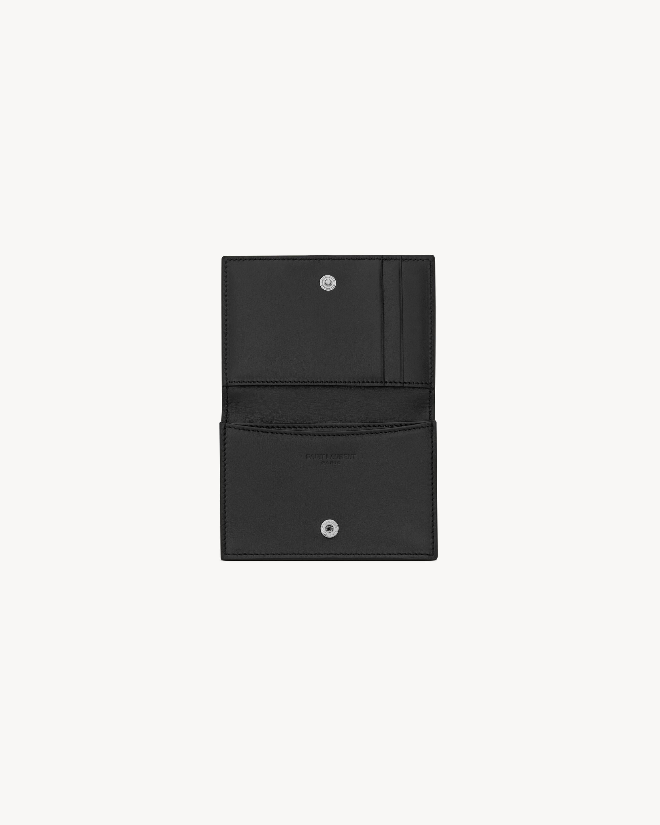 Business card holder with flap in smooth leather in Black | Saint Laurent | YSL EN-AT Business card holder with flap in smooth leather in Black | Saint Laurent | YSL EN-AT