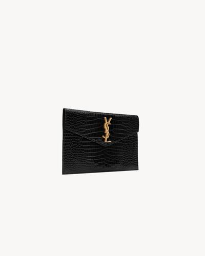 uptown pouch in crocodile-embossed shiny leather