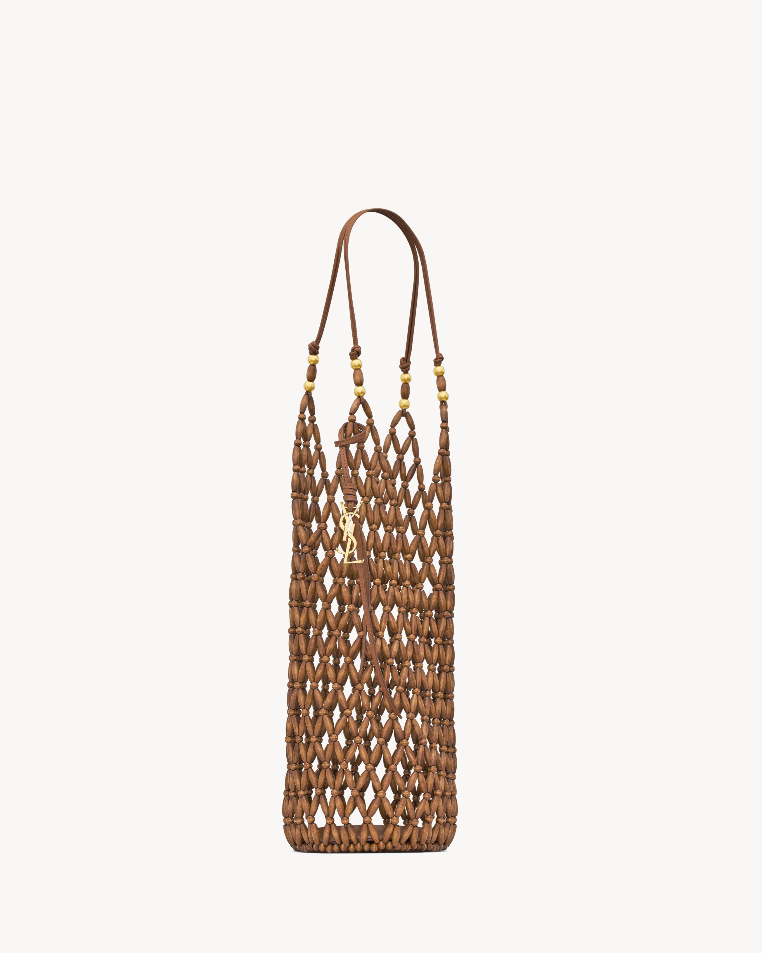 supple bucket in wood beads