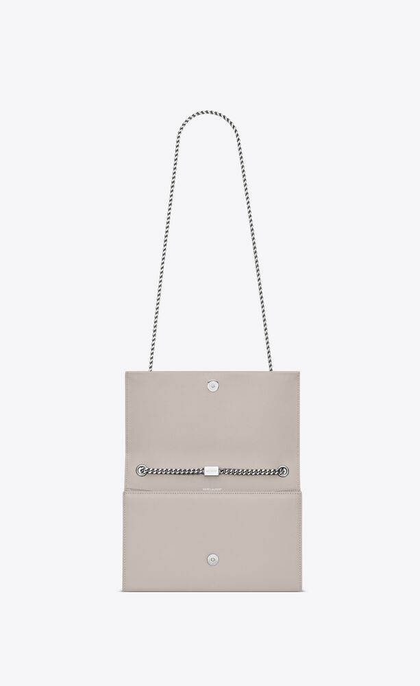 kate medium with tassel in grain de poudre embossed leather