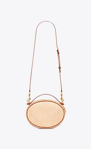camera bag in raffia and vegetable-tanned leather