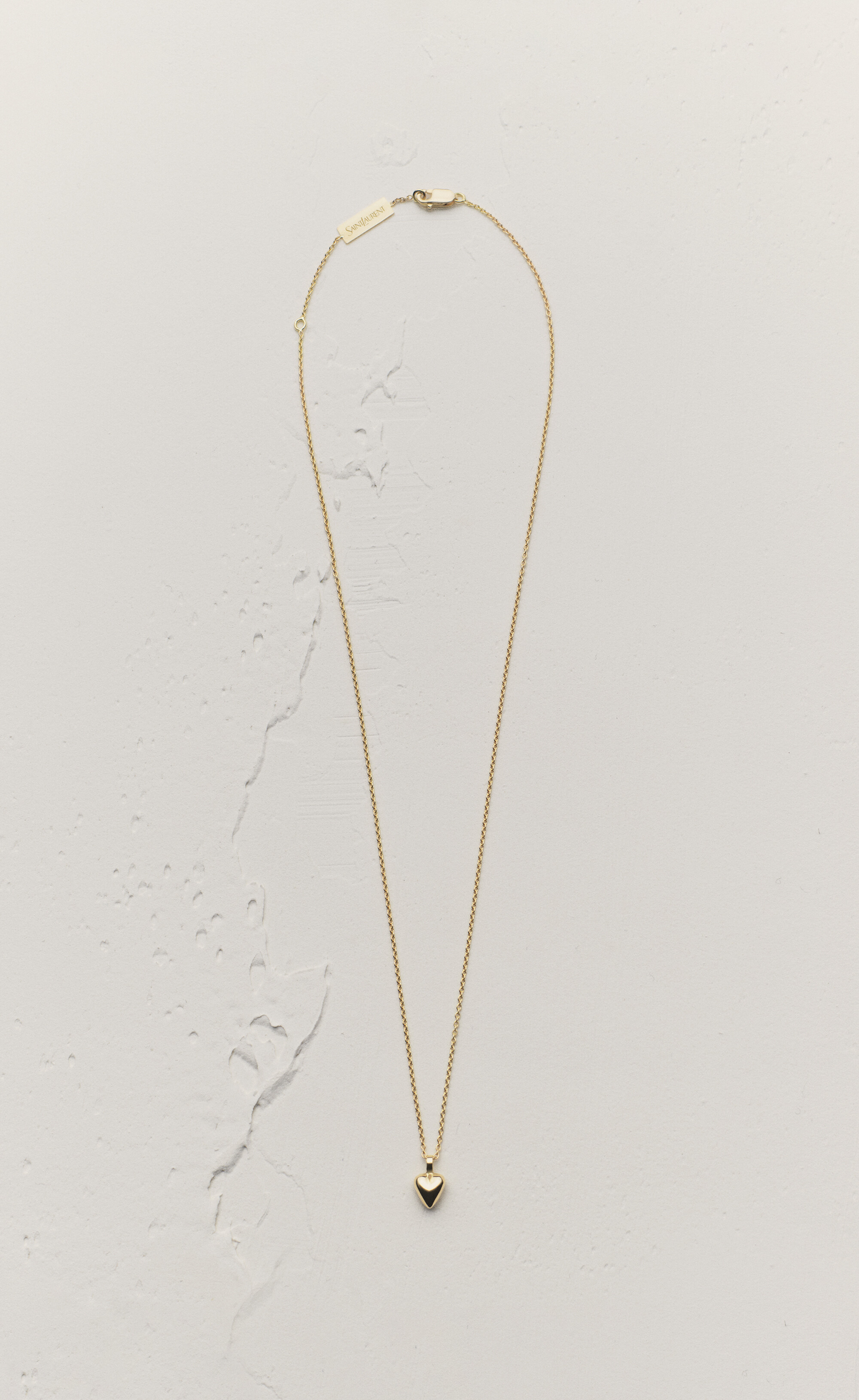 Heart pendant necklace in 18K yellow gold | Saint Laurent | YSL.com