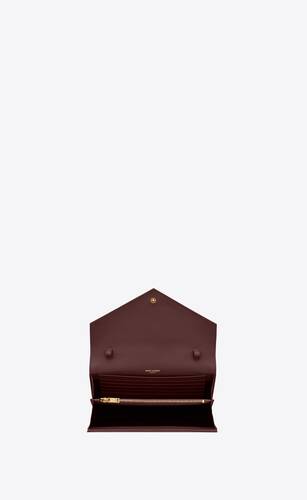 classic cassandre chain wallet in grain de poudre leather
