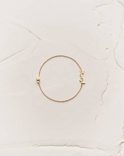 【送料&関税込】Saint Laurent Cassandre Charm Bracelet CASSANDRE bracelet in 18K yellow gold | Saint Laurent | YSL US
