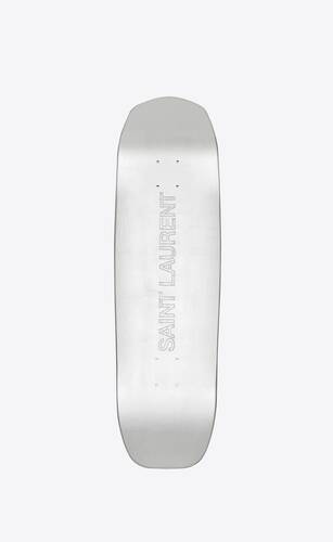 saint laurent skateboard covered with silver leaves