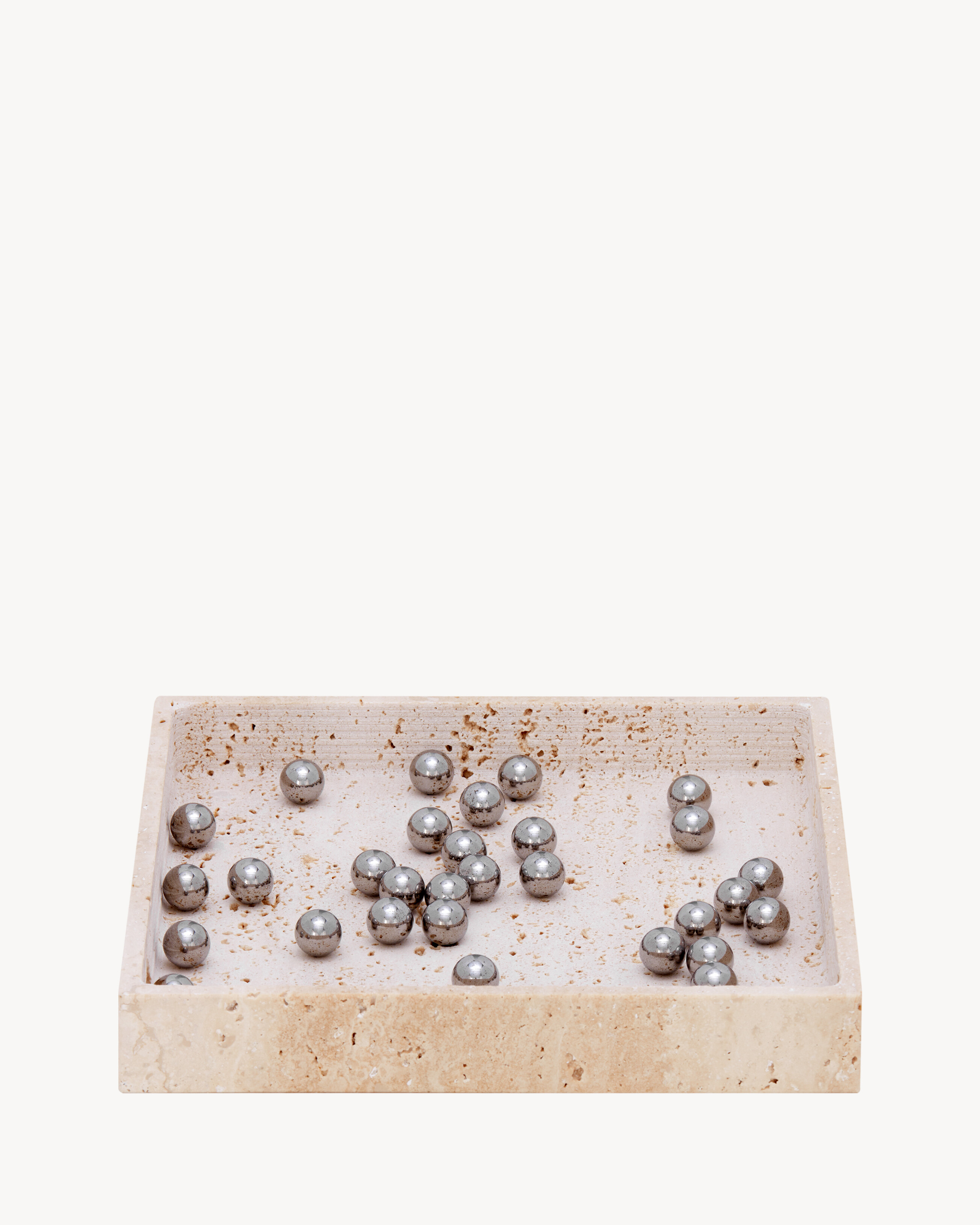 SOLITAIRE IN TRAVERTINE