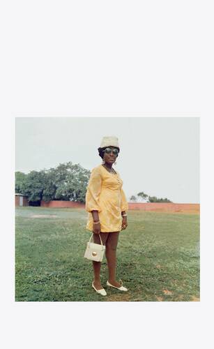 a wedding guest in the park behind the holy trinity cathedral, accra, c. 1971