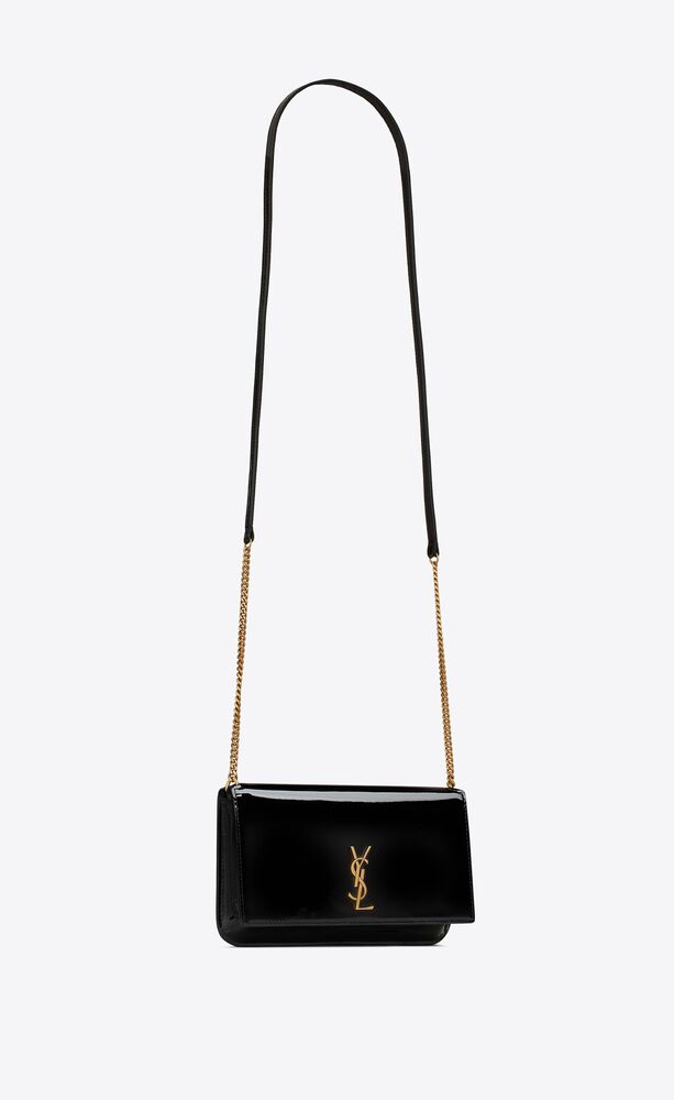 CASSANDRE SAINT LAURENT phone holder with strap IN LAQUERED PATENT ...