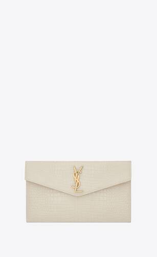 uptown pouch in crocodile-embossed shiny leather